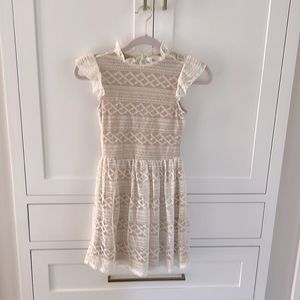 Girls white lace dress with tan underlay- size 10